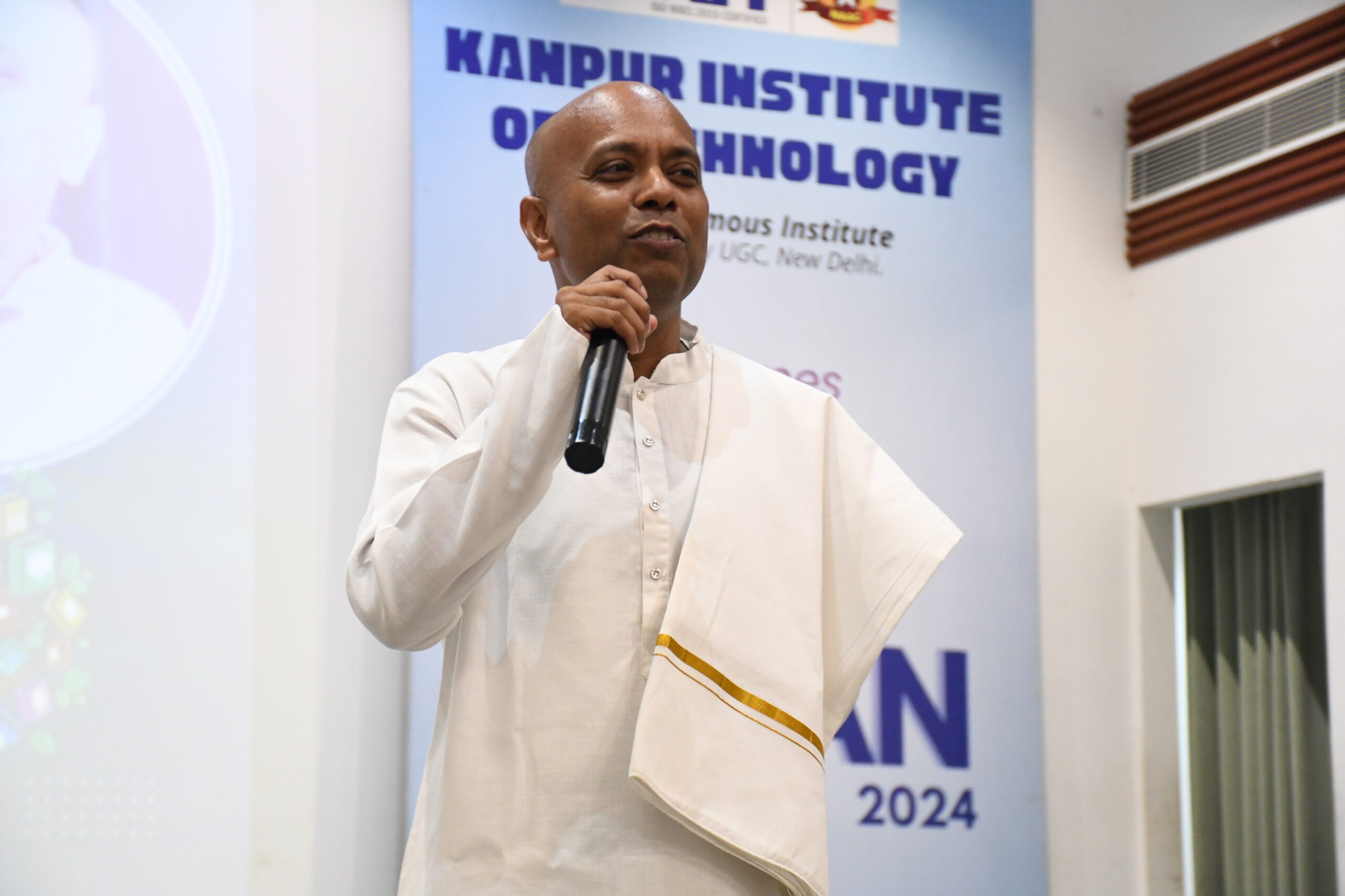 Rudrayogi delivering a spiritual seminar on Vedic wisdom